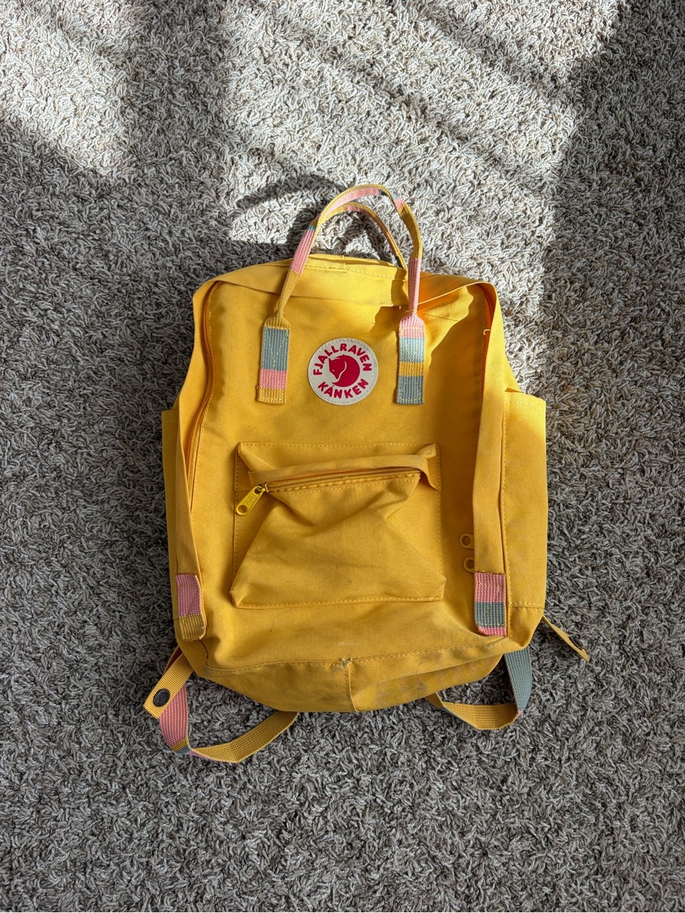 Fjallraven Kanken yellow backpack